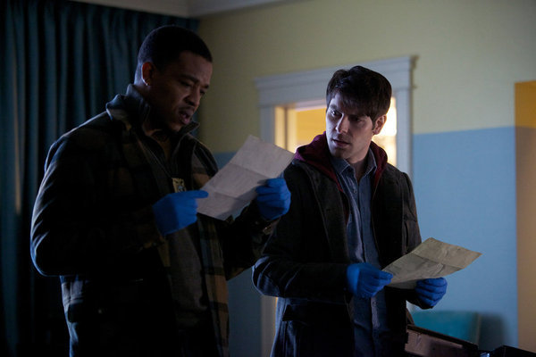 Still of Russell Hornsby and David Giuntoli in Grimm (2011)