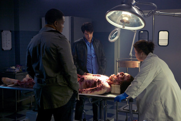 Still of Russell Hornsby and David Giuntoli in Grimm (2011)