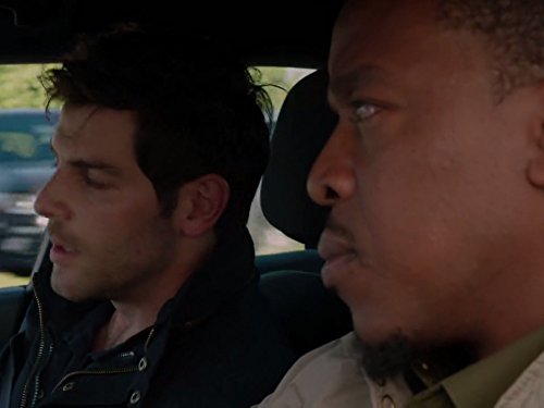 Still of Russell Hornsby and David Giuntoli in Grimm (2011)