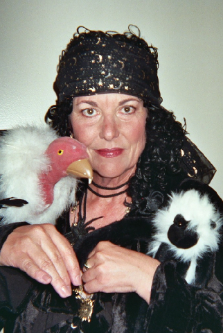 Ruby, the Fortune Teller of Only Good Fortunes, complete with spider monkey and vulture.