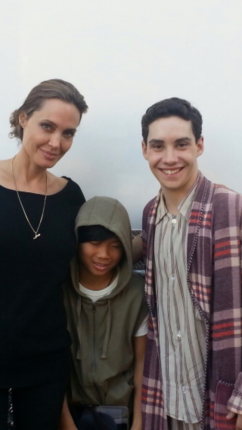 John D'Leo with director Angelina Jolie on the set of 