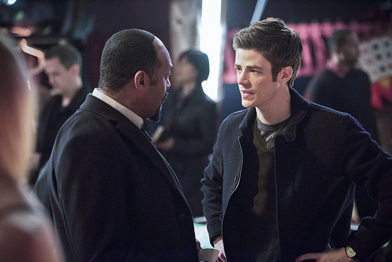 Still of Jesse L. Martin and Grant Gustin in The Flash (2014)