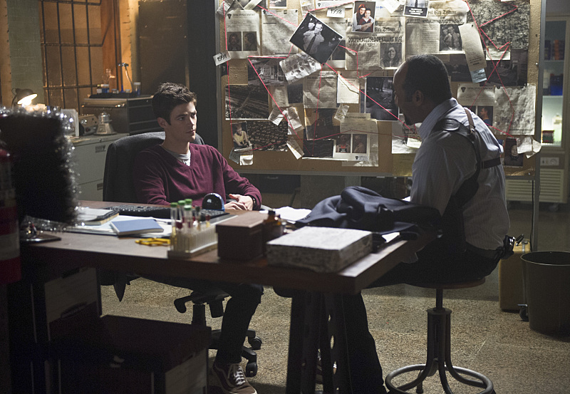 Still of Jesse L. Martin and Grant Gustin in The Flash (2014)