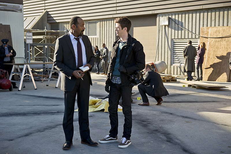 Still of Jesse L. Martin and Grant Gustin in The Flash (2014)