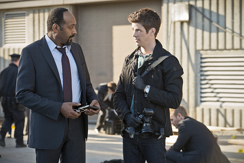 Still of Jesse L. Martin and Grant Gustin in The Flash (2014)