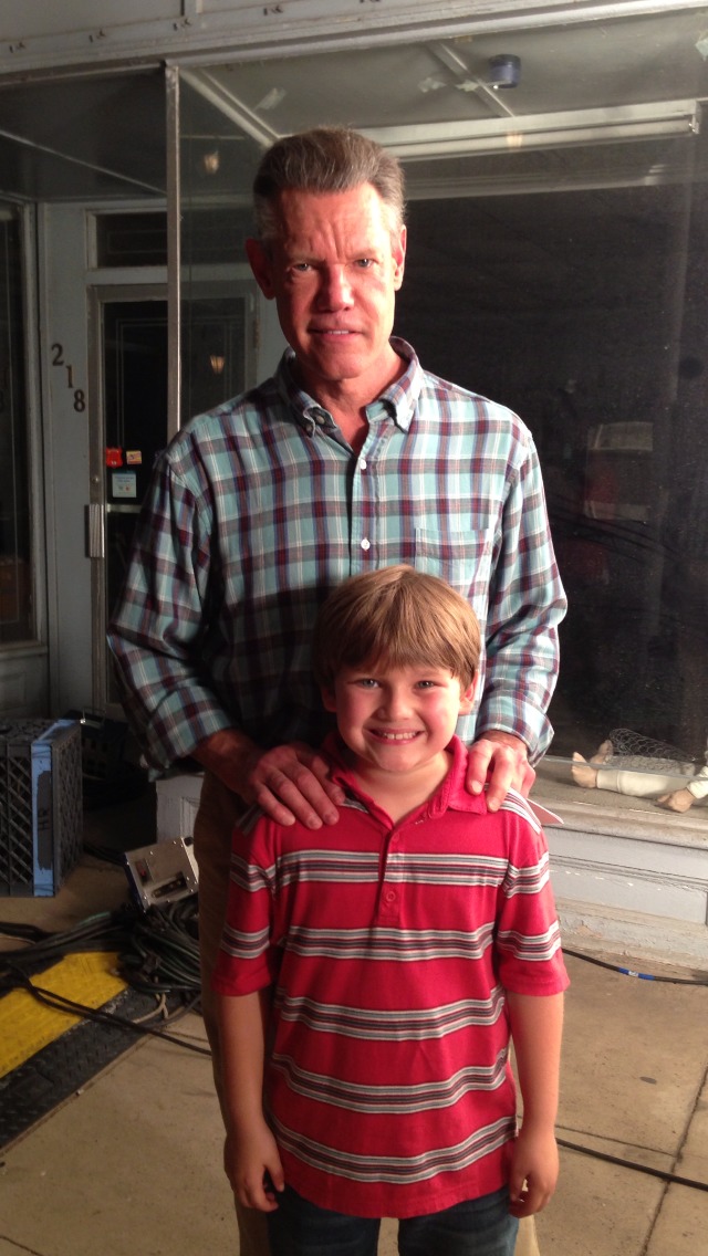 Brody Rose with Randy Travis on the set of 