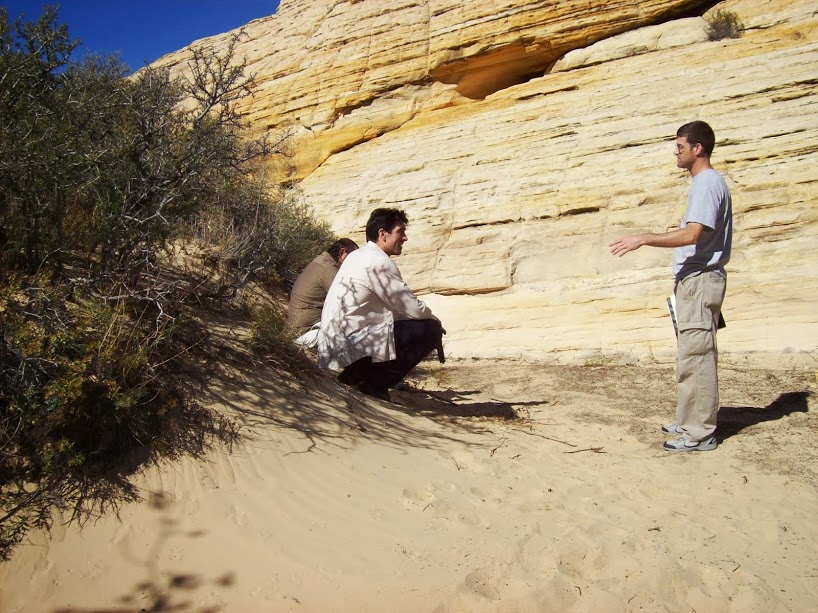 Jason Anthony Fisher provides direction in discussing the next scene with actors Nathan Ferrier and Sam Osman for their movie A.K.A. The Surgeon.