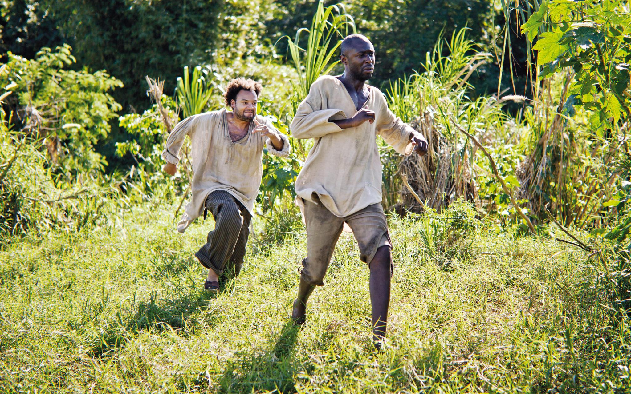 Still of Fabrice Eboué and Thomas N'Gijol in Case départ (2011)