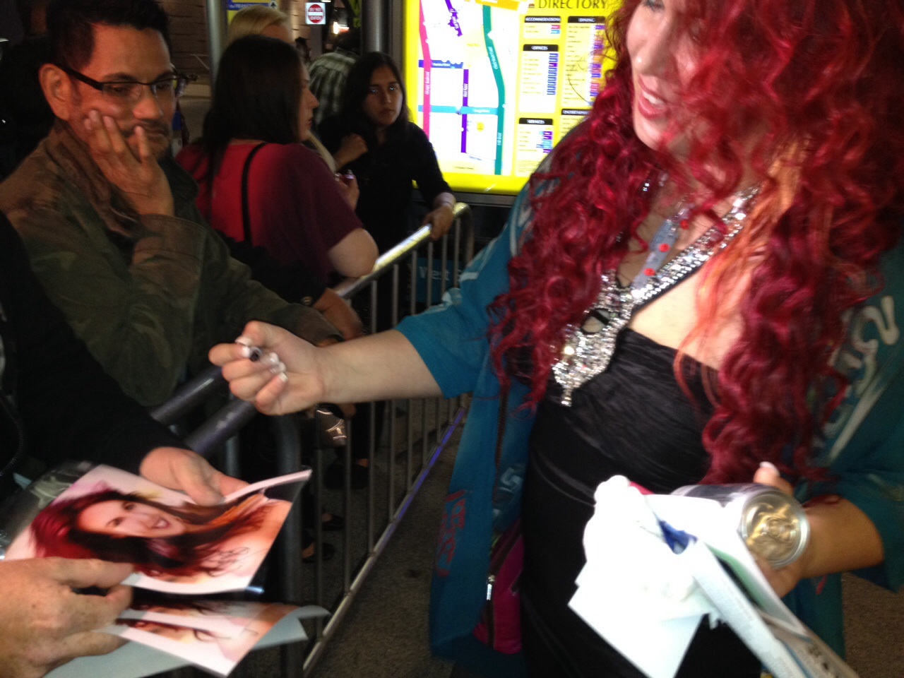 Actress Fileena Bahris signs autographs for fans at Universals Los Angeles Premiere of BATTLESHIP