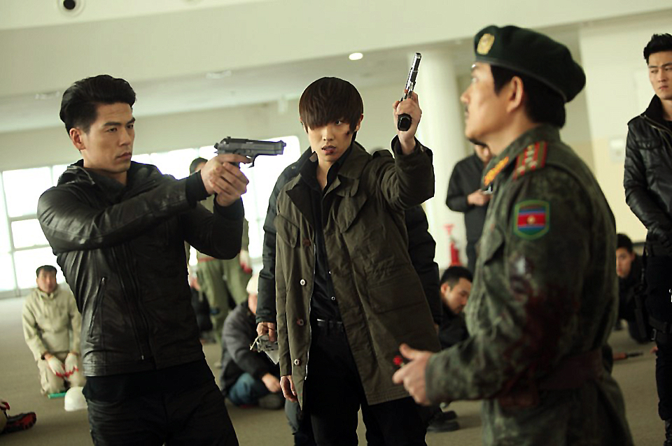 Still of Rich Ting and Joon Lee in Iris (2013)