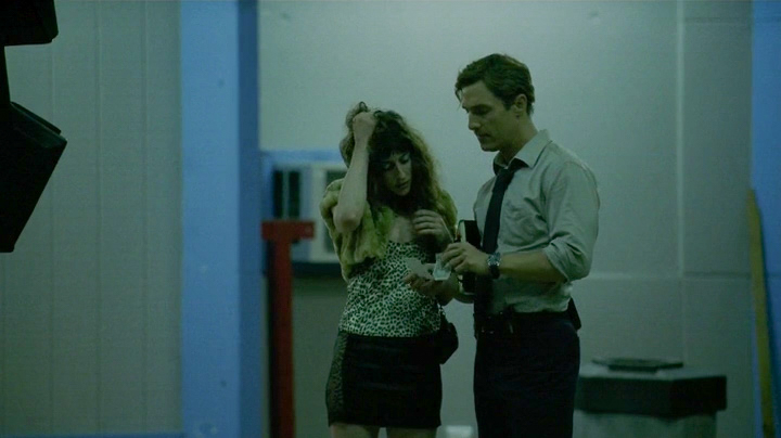 Still of Kate Adair with Detective Rust Cohle in True Detective.