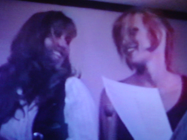 Kimberly and Patti Hansen Richards reading commercial copy.