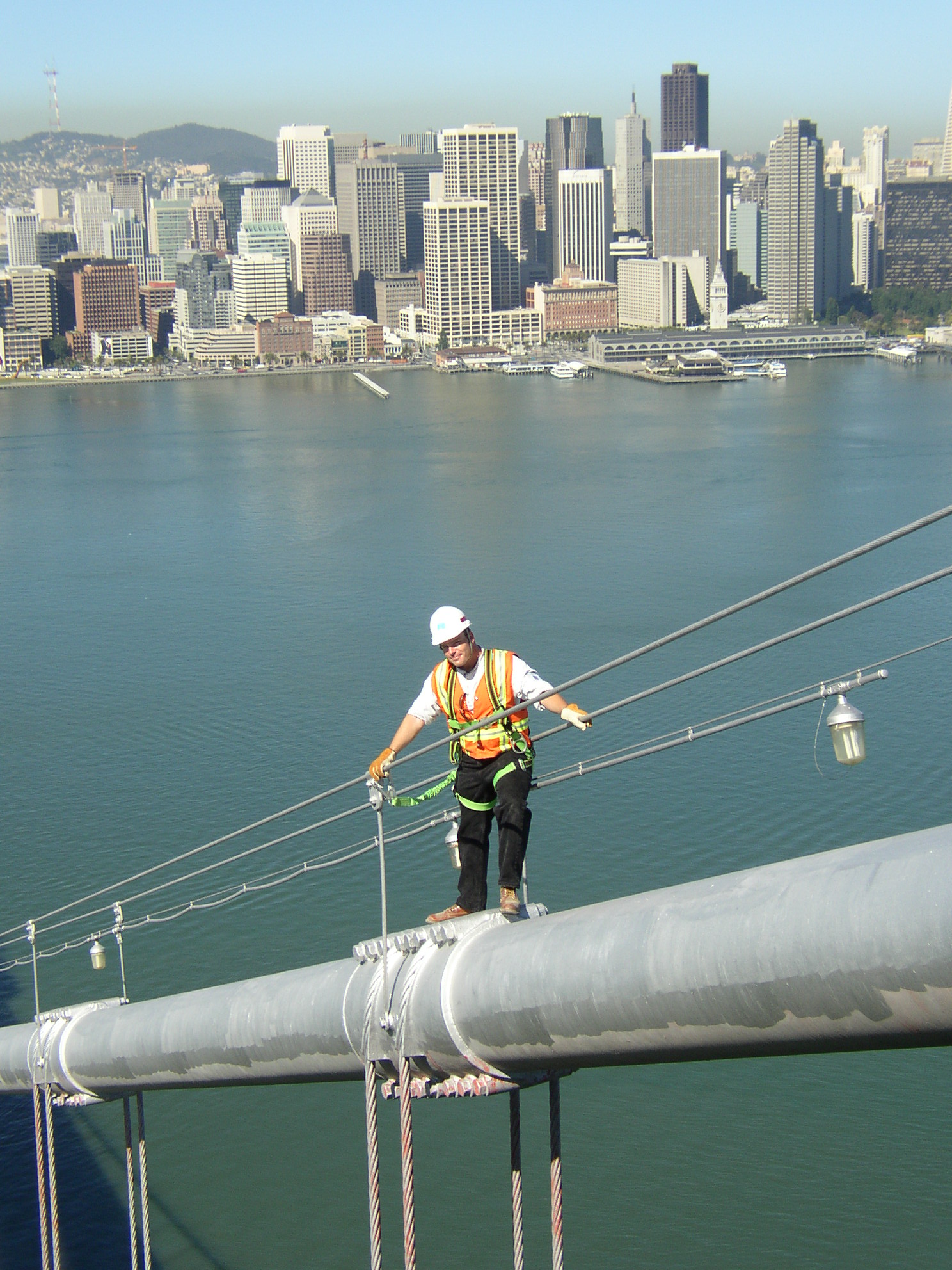 Climbing the main cable of the Bay Bridge West Span in San Francisco.