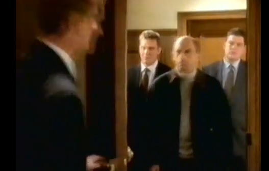 Andrew Blackall (Right)playing an MI5 operative, featured here in one of the Rowan Atkinson Barclay Card Commercials.