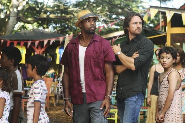 Still of Jason George and Martin Henderson in Off the Map (2011)