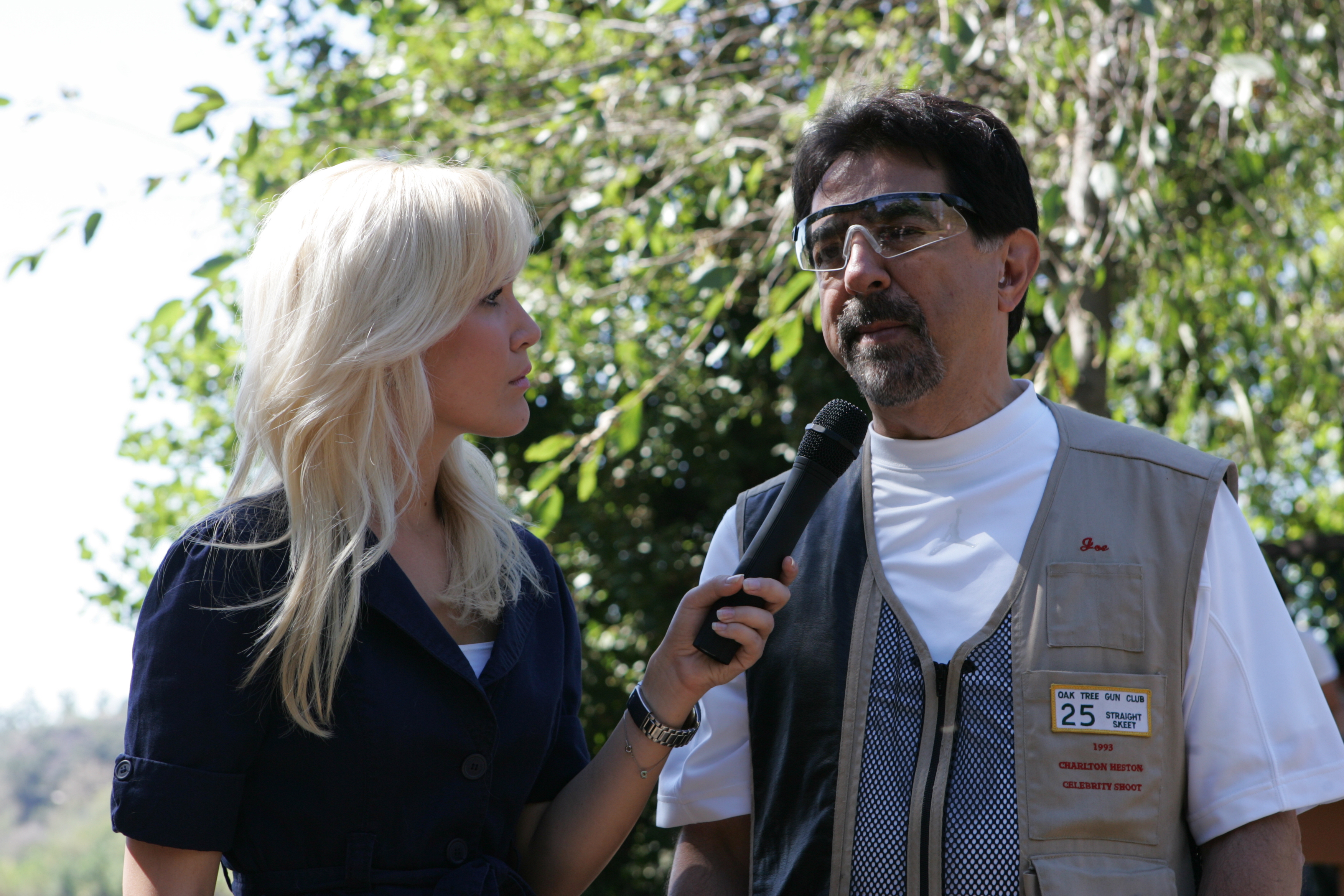 Danika Quinn interviewing Joe Mantegna at the Sporting Clays Event.