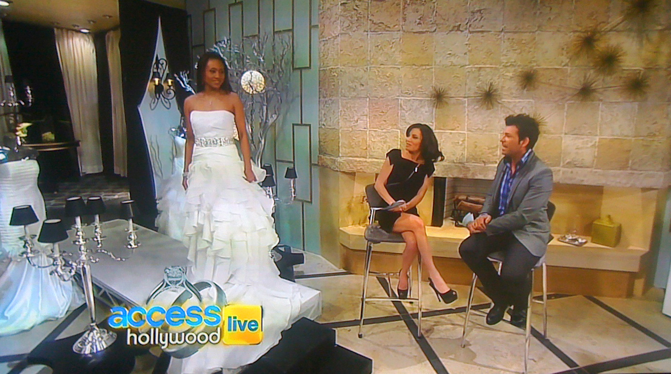 Vaja modeling a David Tutera wedding gown inspired by Chelsea Clinton's wedding dress live on Access Hollywood