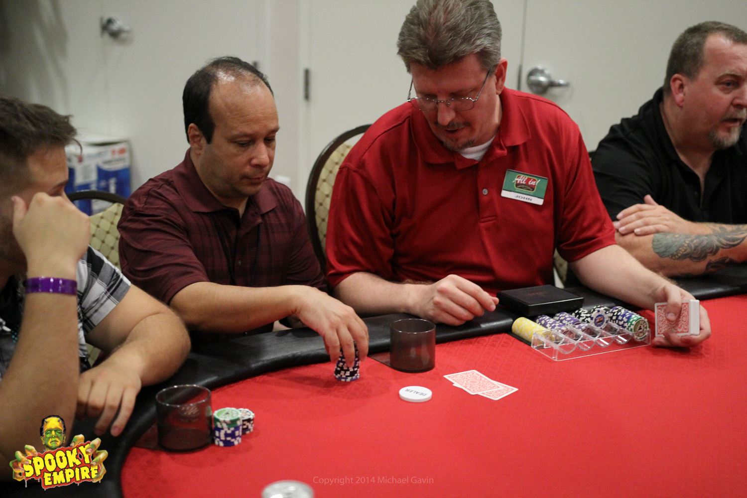 Michael J. Tomaso dealing a hand at the celebrity charity poker tournament at Spooky Empire.