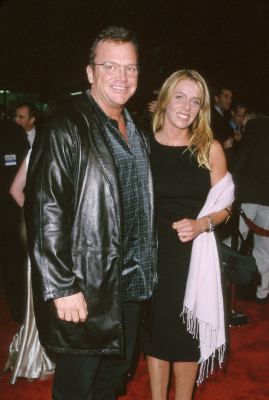 Tom Arnold at event of End of Days (1999)