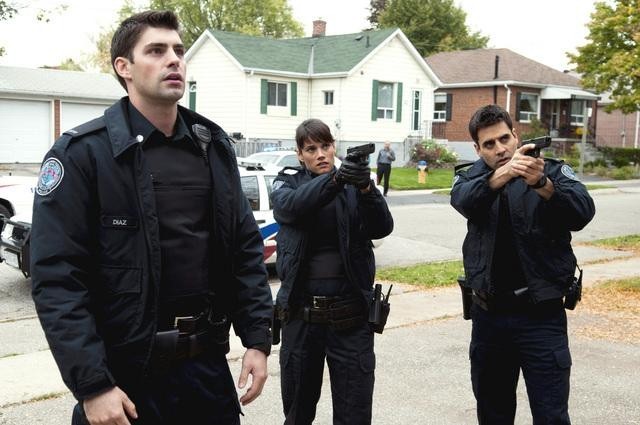 Still of Ben Bass, Missy Peregrym and Travis Milne in Rookie Blue (2010)