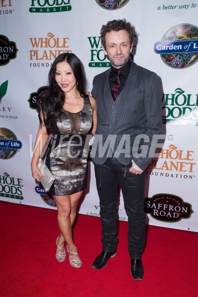 Toni Lee and Michael Sheen attend the Whole Planet Foundation's Pre-GRAMMY event at Village Recorder Studios on January 23, 2014 in LA, CA