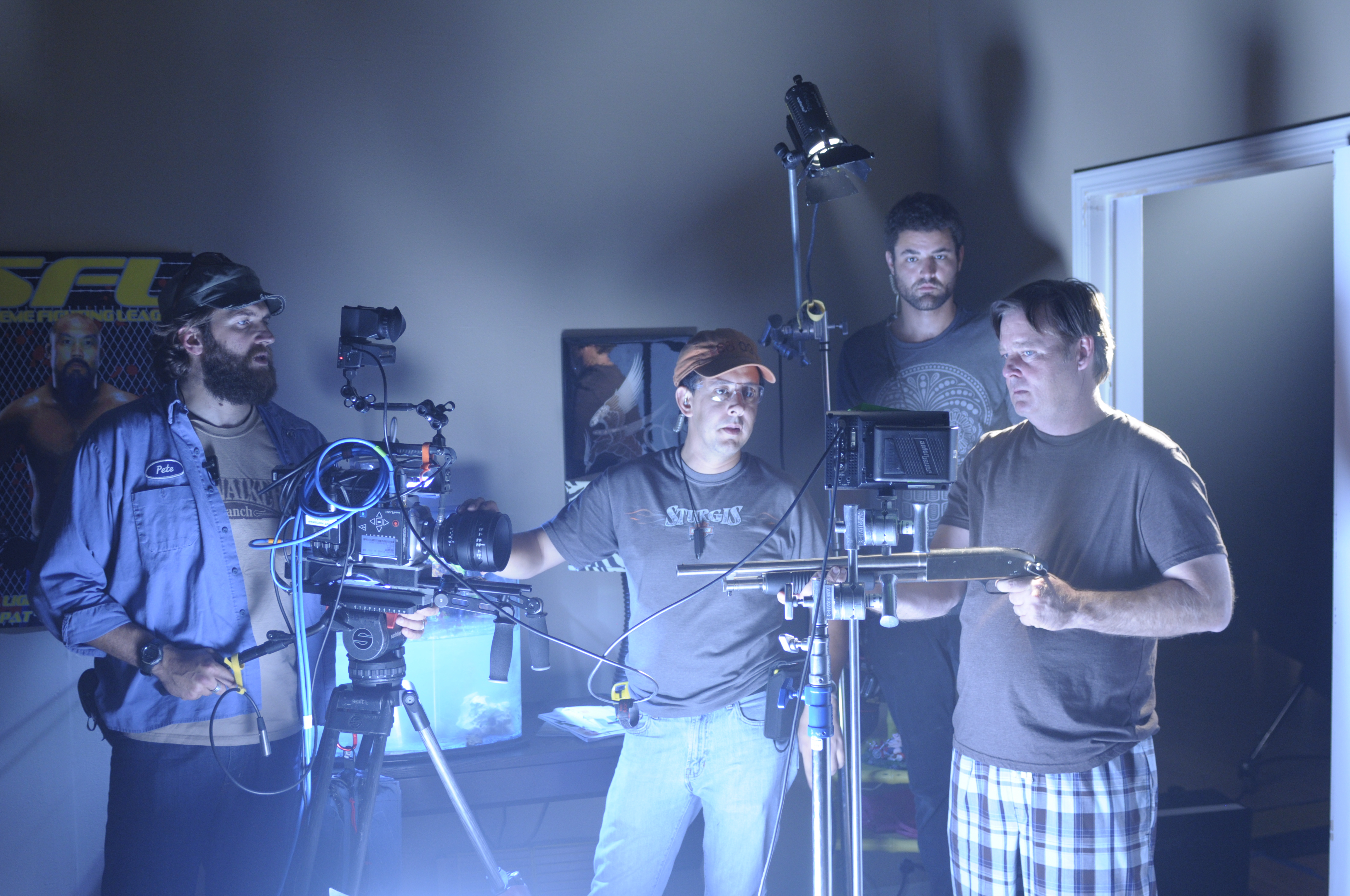 Set Photo, God Bless America. Actor Joel Murray, 1st AC John Reyes, BBoy Electric Joel Marich, cinematographer Bradley Stonesifer