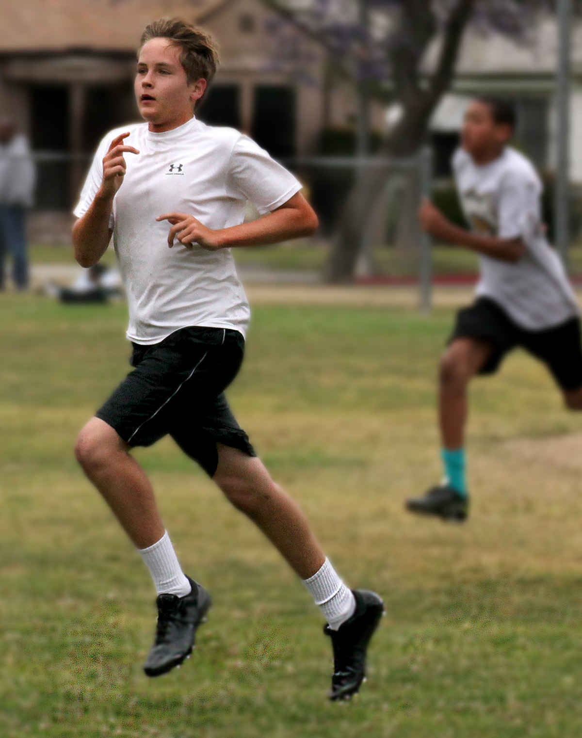 Jack Graham trains for his tackle football team on June 11, 2011. Jack is his team's quarterback and the Fall 2011 season will be his 4th year in youth league football.