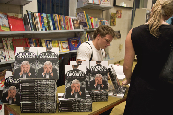 Julian Shaw signs copies of Modern Odysseus at the Ariel Booksellers launch in Sydney.