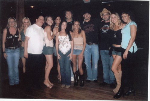 Magnum on location in 2008 with some of his models and other models on one of the Music Video Filming Sets for the Band Blackhawk! This was in Nashville, TN