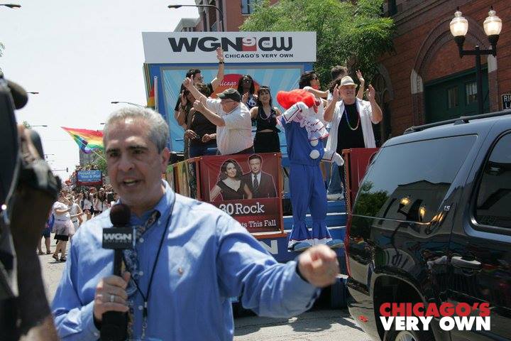 Reporting for WGN-TV segment for 9pm News; Gay Pride Parade on 06 26 11. Behind me, the WGN-TV parade float and Bozo the Clown leading the way!
