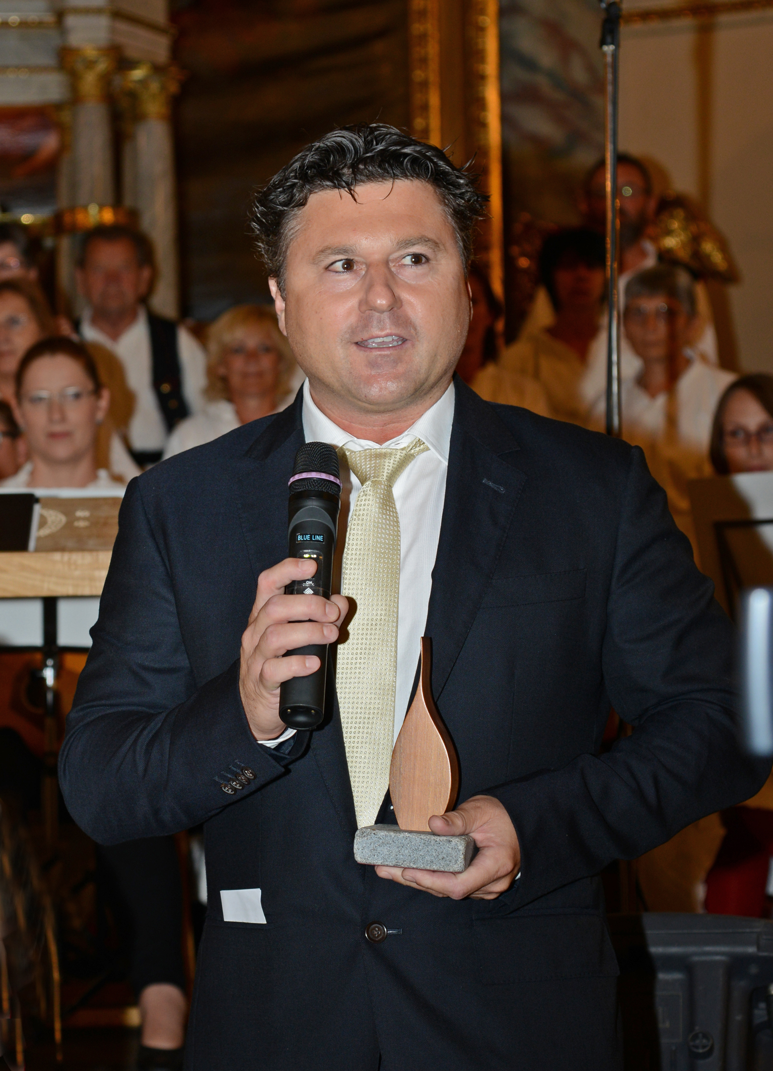 Director Wolfgang Santner with the Flame Of Peace Award