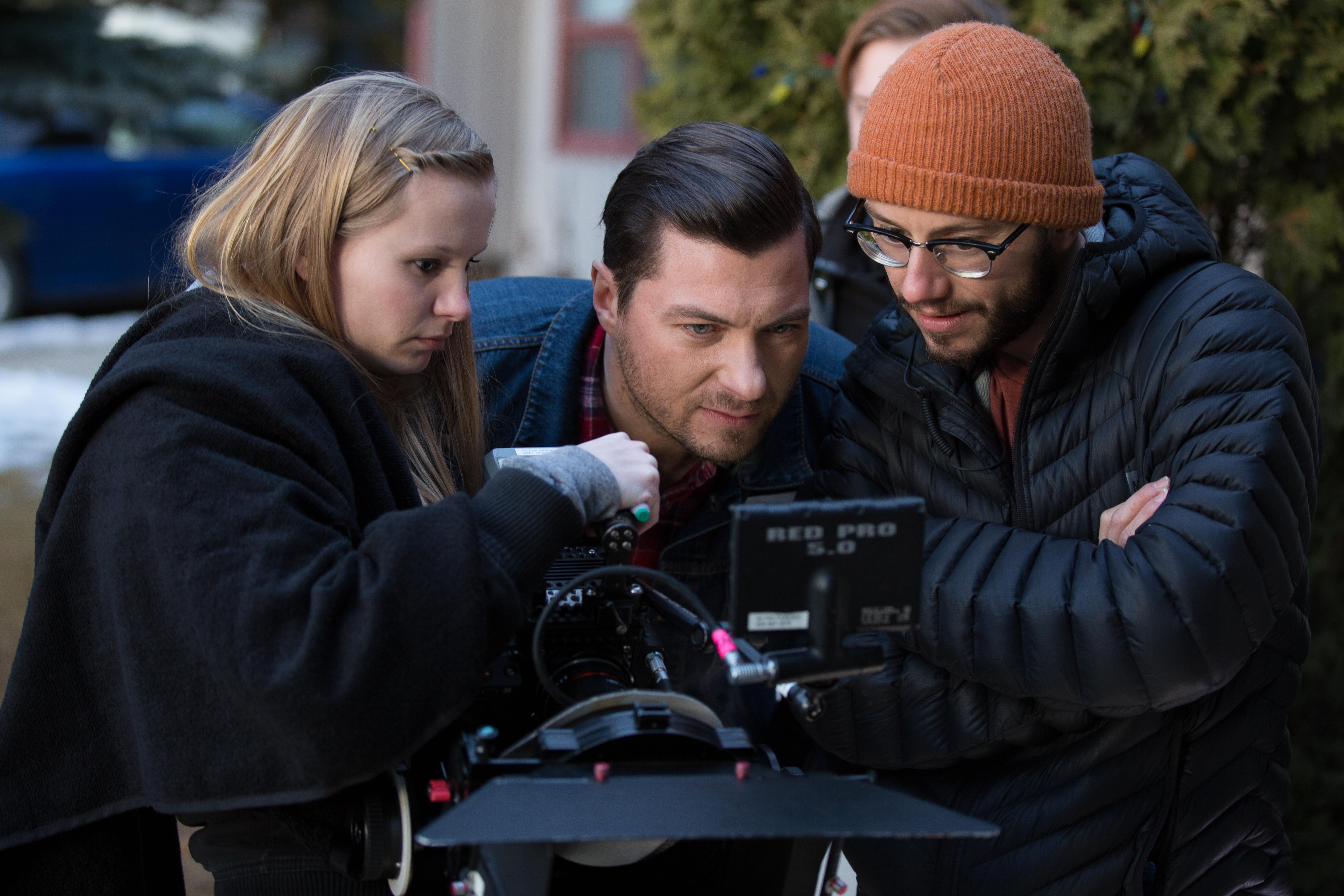 Chelsea Carrick, Todd Kipp and Aaron Bernakevitch on location during filming for 