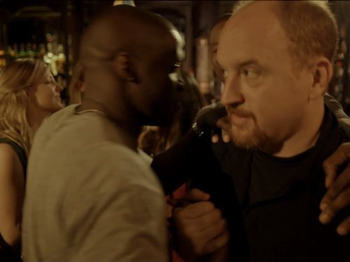 Still of Louis C.K. and Godfrey in Louie (2010)