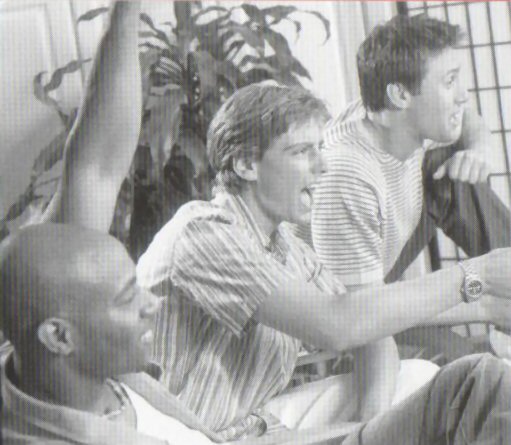 Tim (center) in a brochure for apartments.