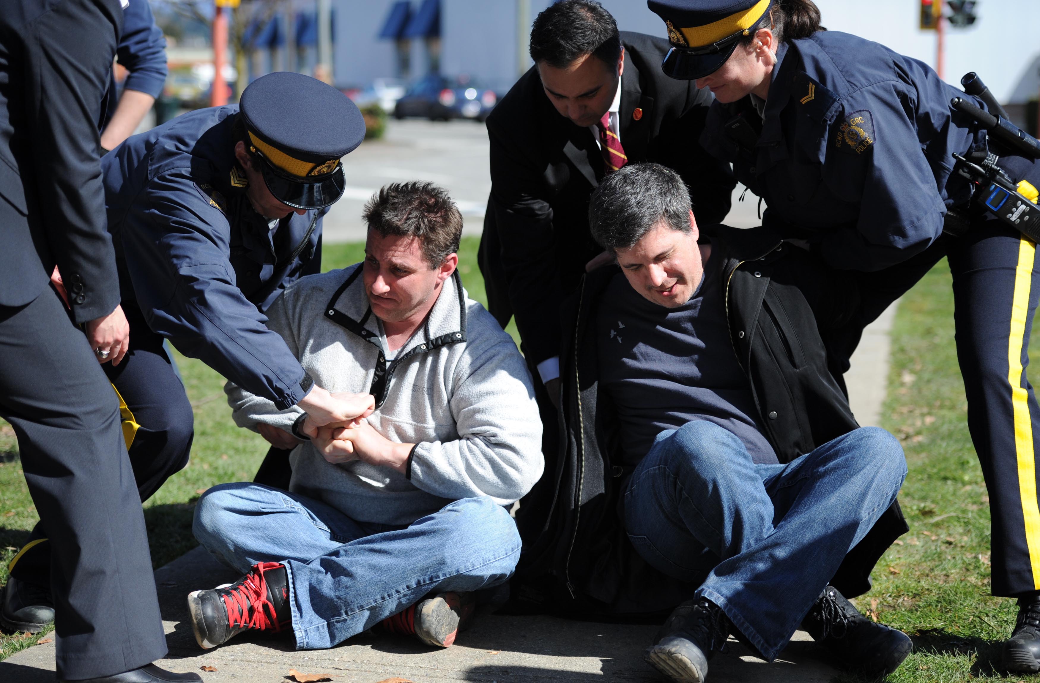 IMIM On-set - RCMP Multi-media - Protestors being arrested..