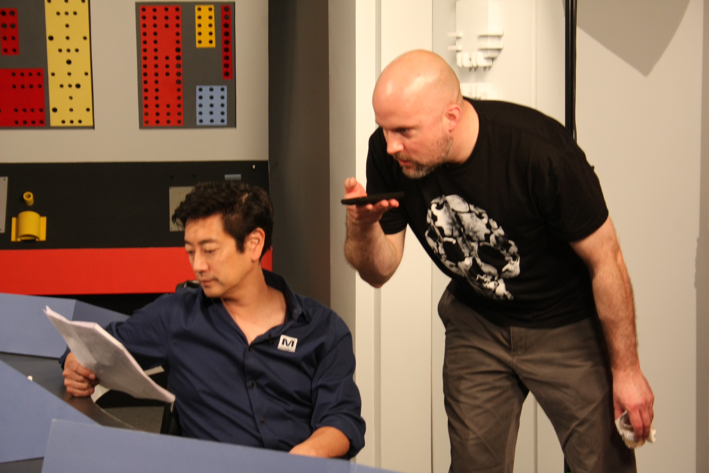 Host Grant Imahara reviewing script before shoot with Director Jeremy Snead