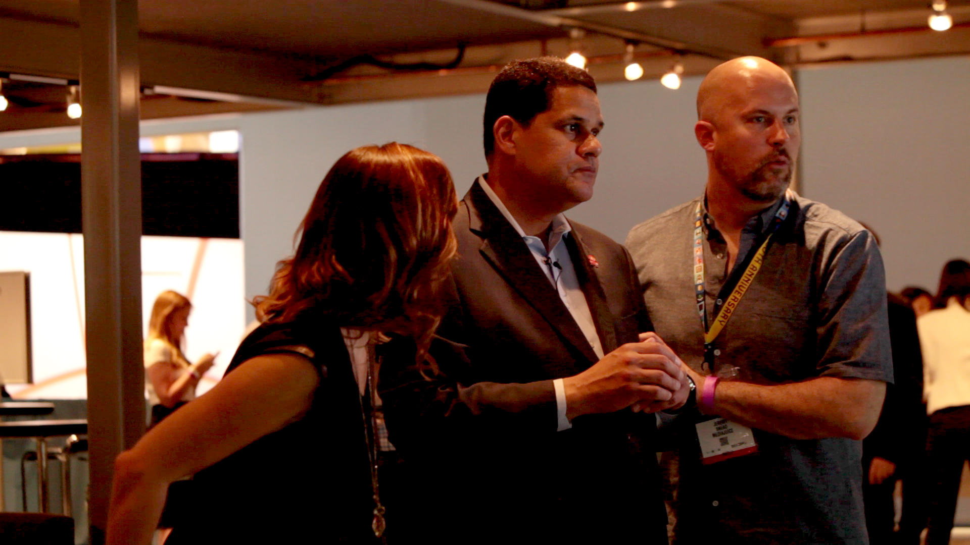 Jeremy Snead and host Alison Haislip on set with Nintendo CEO Reggie Fils-Aimee