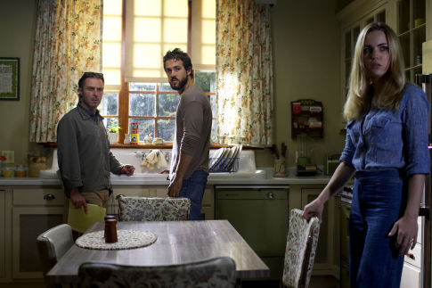Director ANDREW DOUGLAS with RYAN REYNOLDS and MELISSA GEORGE on the set of THE AMITYVILLE HORROR.