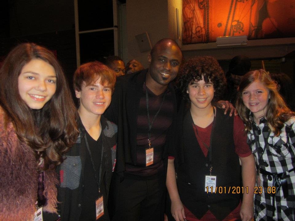 Bryce Hitchcock and friends with Wayne Brady backstage at Artists for Peace Organization's 