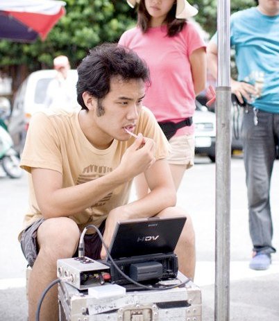 Bruce Hwang Chen on the set of Scumbag, Pervert, and the Girl in Between