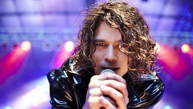Still of Luke Arnold in Never Tear Us Apart: The Untold Story of INXS (2014)