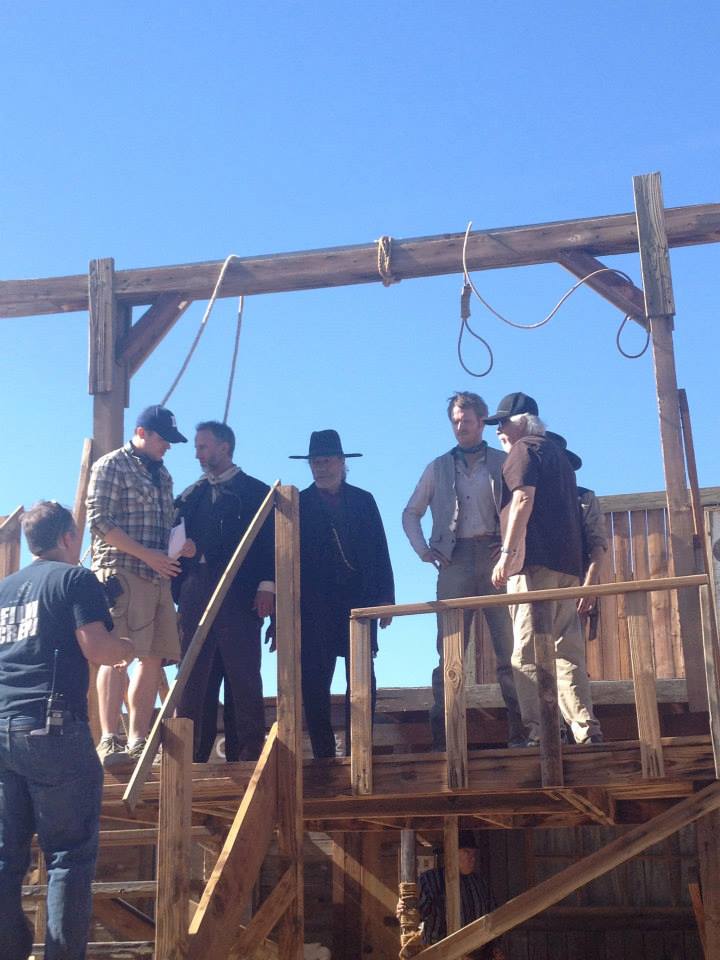 Writer/Director Thomas Torrey with actors Pat Dortch, Edward James Olmos, and Isaiah Stratton, and cinematographer Renyaldo Villalobos on the set of House of the Righteous (2014).