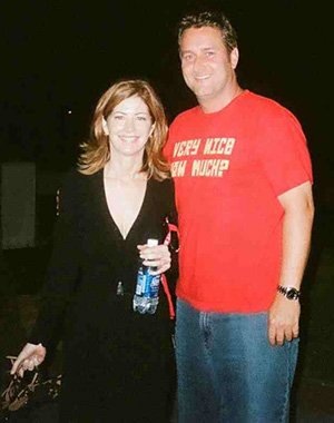 Tim Crockett and Dana Delany stroll down the streets in New York City.