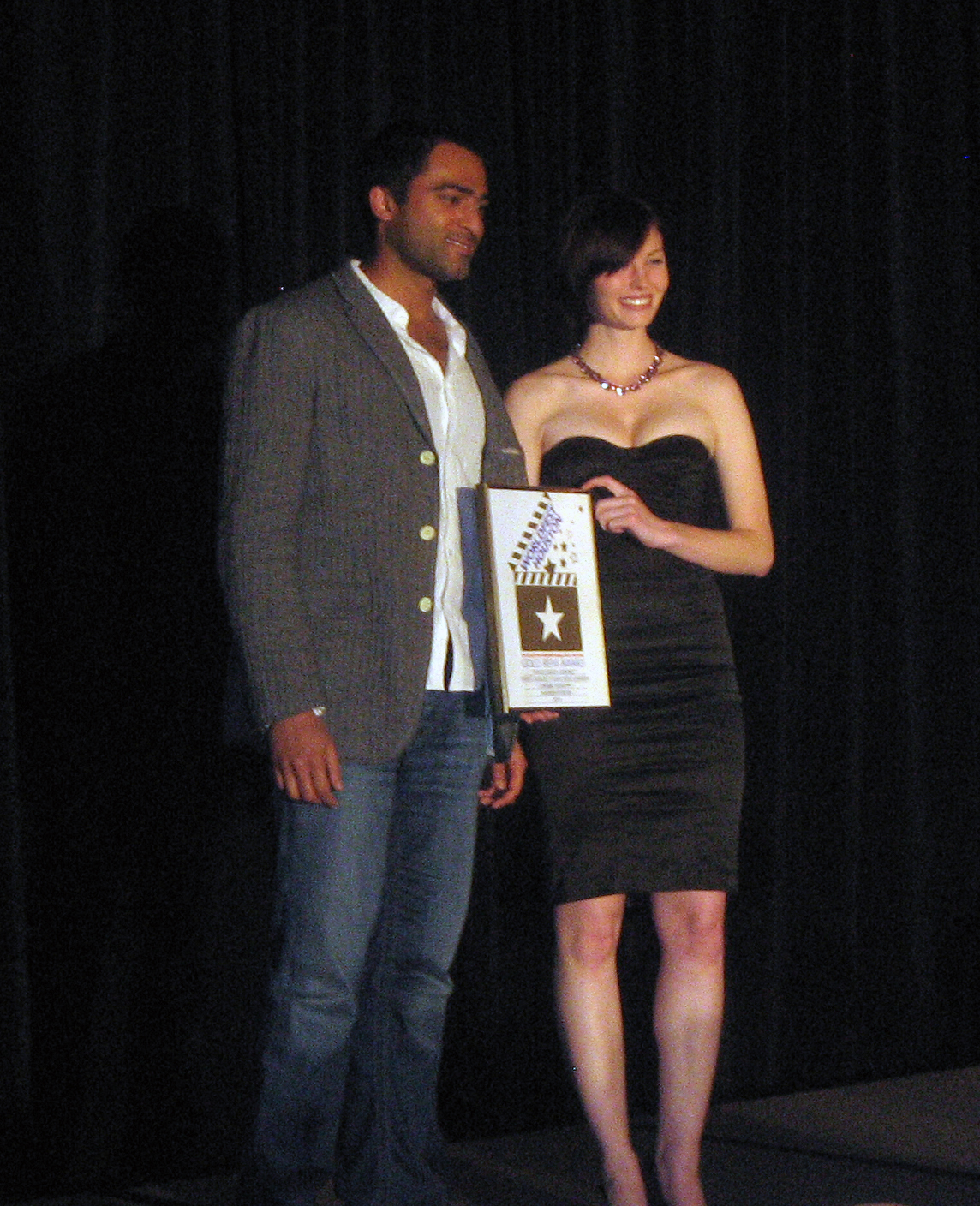 Pereira accepting Gold Remi award for WHO'S GOOD LOOKING at Houston World Fest April 2010.