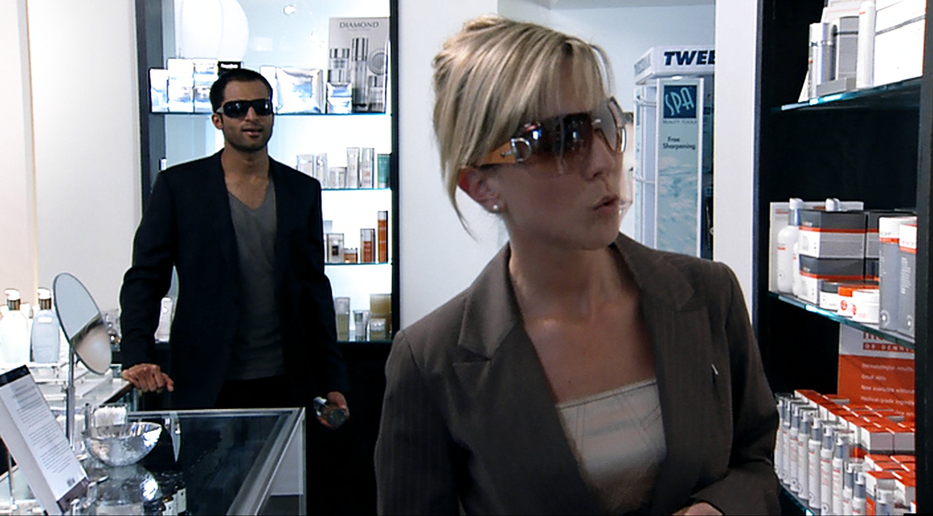 HD still from WHO'S GOOD LOOKING? written and directed by Warren Pereira showing O'Grady and Pereira.