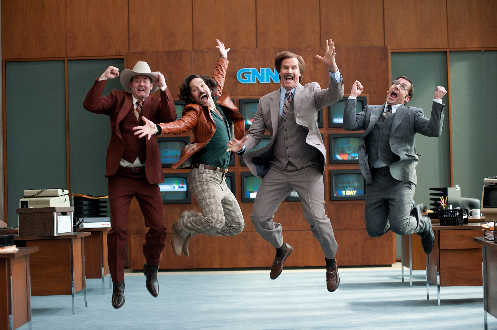 Still of Will Ferrell, Steve Carell, David Koechner and Paul Rudd in Anchorman 2: The Legend Continues (2013)