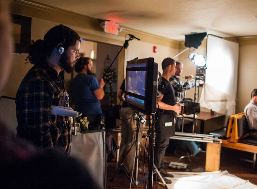 Director Marcus Slabine on the set of The Audit.