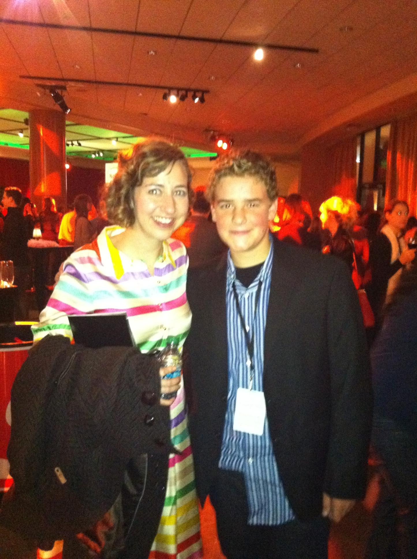 Justin with Kristen Schaal at the Muppet premier