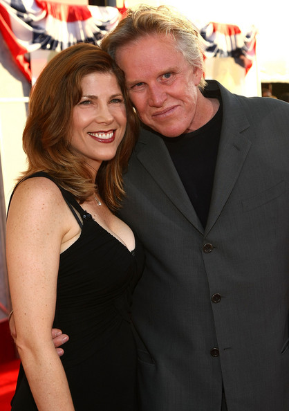 Steffanie Sampson and Gary Busey arrive at the world premiere of Touchstone Pictures' 