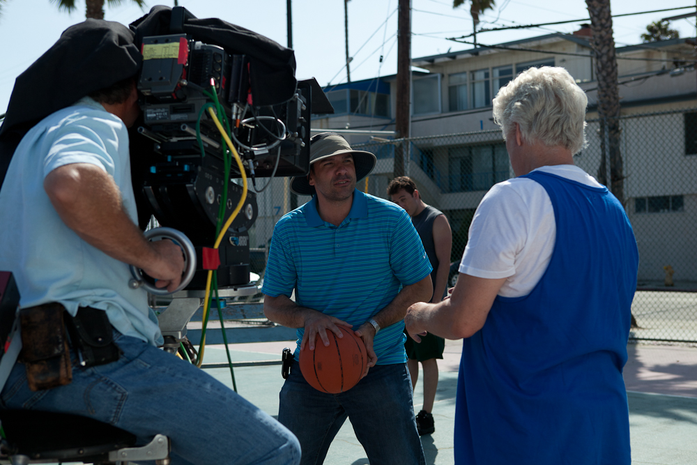 Joe Menendez gives Bruce Davison basketball pointers on the set of 